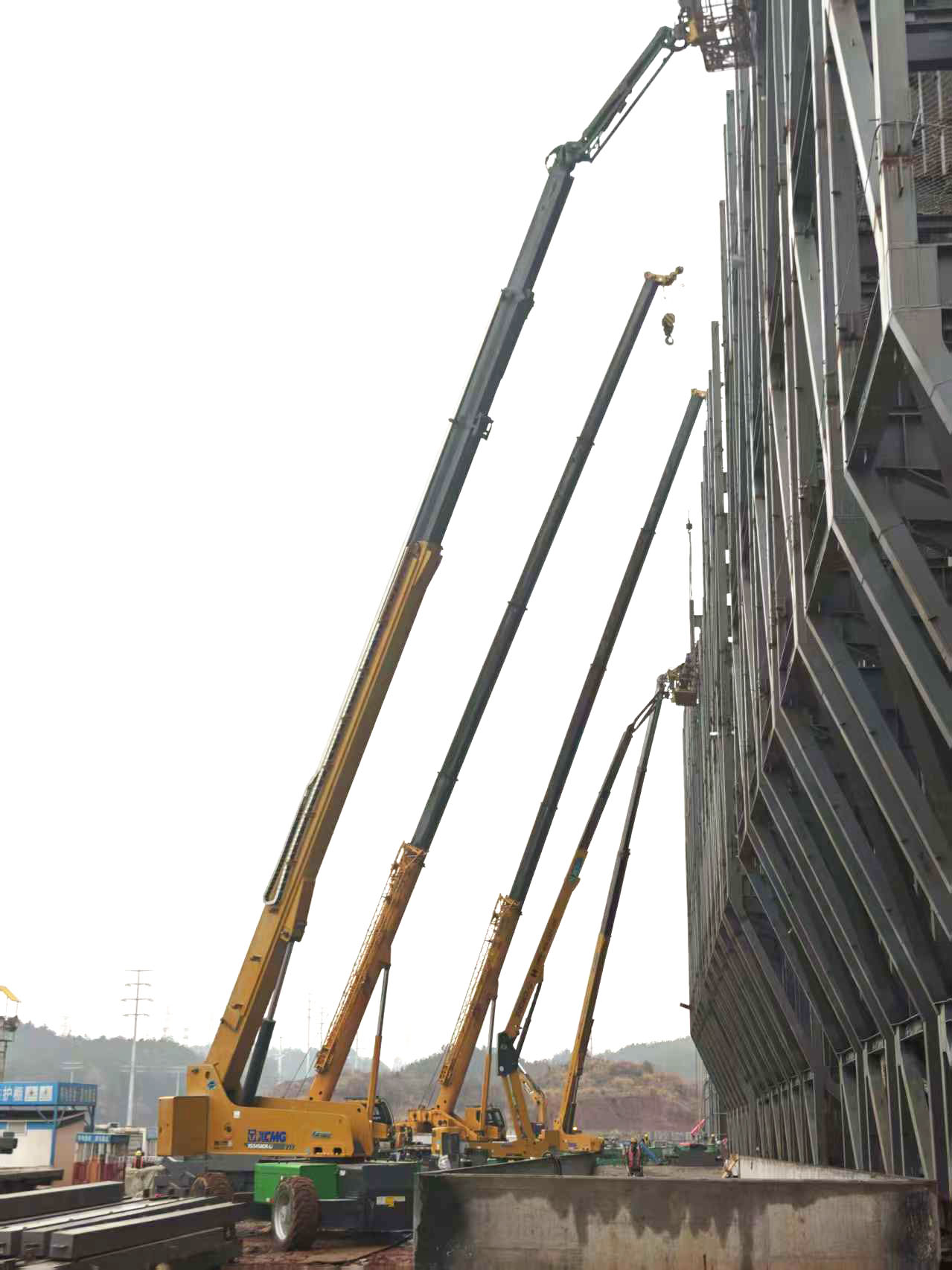 高空協(xié)同顯實(shí)力｜徐工裝備助陣銀聯(lián)黃山園區(qū)，外立面施工提質(zhì)增效